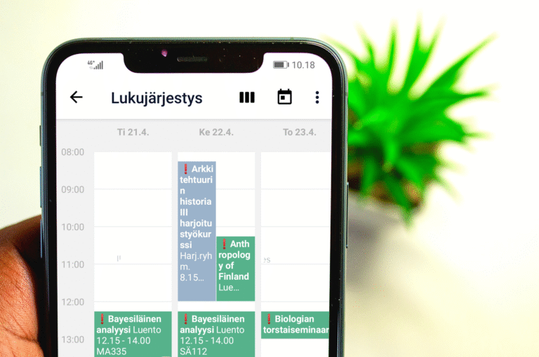 Puolikas puhelin, jossa Tuudon lukujärjestys